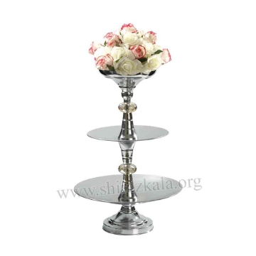 تصویر  ظرف سه طبقه نقره ای میوه و شیرینی با گل مصنوعی پیونی